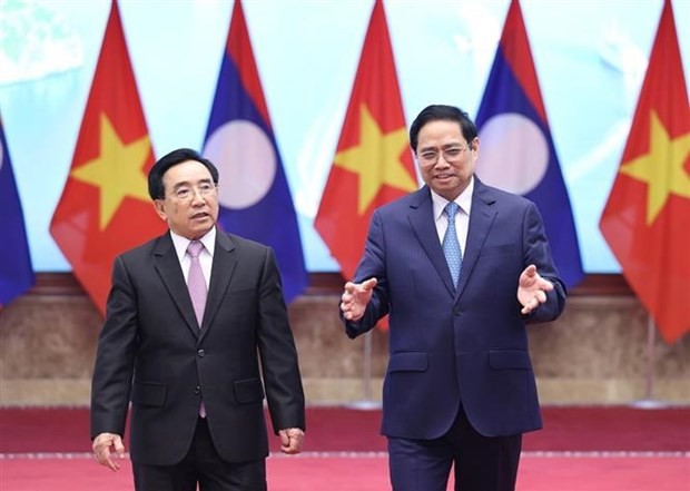 Thủ tướng Phạm Minh Chính và Thủ tướng Lào Phankham Viphavanh dự Lễ phát động Năm Đoàn kết Hữu nghị Việt Nam-Lào, Lào-Việt Nam 2022, ngày 8/1/2022 (Ảnh: Dương Giang/TTXVN). Thủ tướng Phạm Minh Chính và Thủ tướng Lào Phankham Viphavanh dự Lễ phát động Năm Đoàn kết Hữu nghị Việt Nam-Lào, Lào-Việt Nam 2022, ngày 8/1/2022 (Ảnh: Dương Giang/TTXVN).