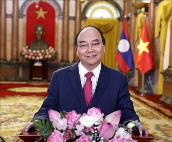 Chủ tịch nước: Mối quan hệ Việt Nam - Lào sẽ tiếp tục nở hoa thơm, kết trái ngọt