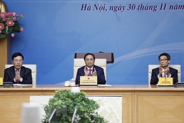 Thủ tướng Phạm Minh Chính chủ trì Hội nghị Tổng kết công tác ngoại giao vaccine (Ảnh: Dương Giang/TTXVN).