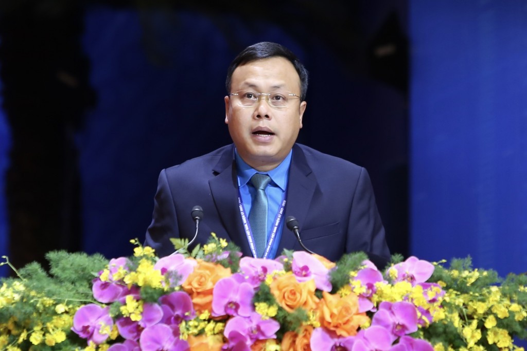 Ông Phạm Quang Thanh, Chủ tịch Liên đoàn Lao động TP Hà Nội tham luận.