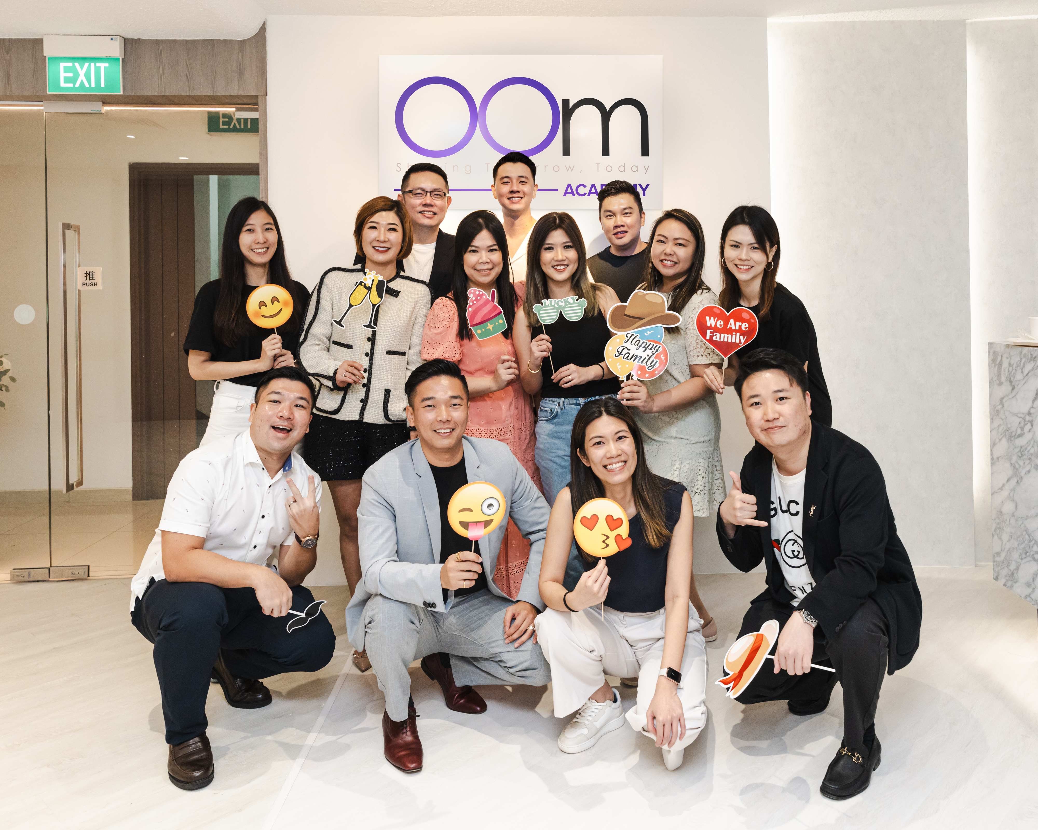 Group photo at the grand opening of OOm Academy