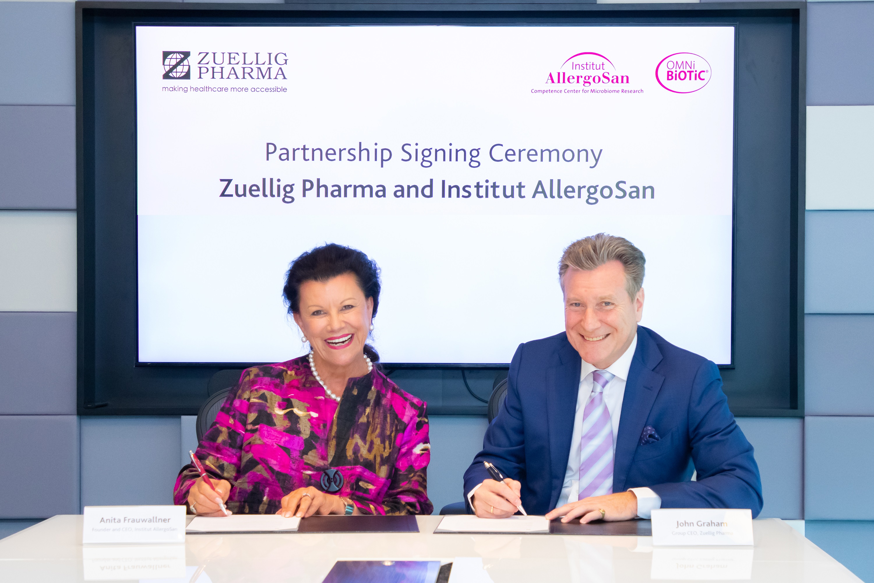 Anita Frauwallner, founder and CEO of Institut AllergoSan (left) and John Graham, Group CEO, Zuellig Pharma (right) at the partnership signing ceremony to bring OMNi-BiOTiC® to key markets in Asia.