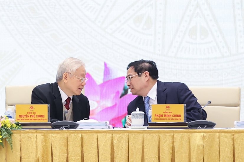 Tổng Bí thư Nguyễn Phú Trọng trao đổi với Thủ tướng Phạm Minh Chính tại Hội nghị Chính phủ với địa phương vào tháng 1/2022 - Ảnh VGP/Nhật Bắc