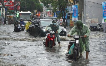 Thời tiết hôm nay (8/9): Bão số 3 suy yếu thành áp thấp, Hà Nội mưa to đến rất to