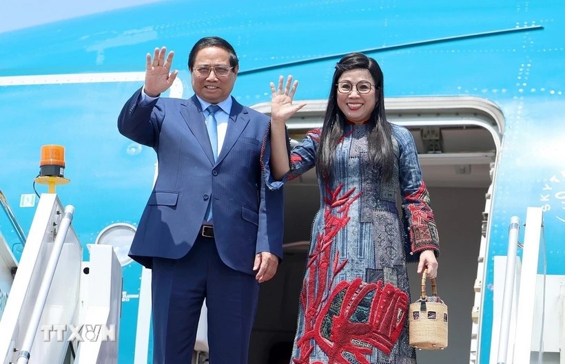 Thủ tướng Phạm Minh Chính và Phu nhân. (Ảnh: Dương Giang/TTXVN)