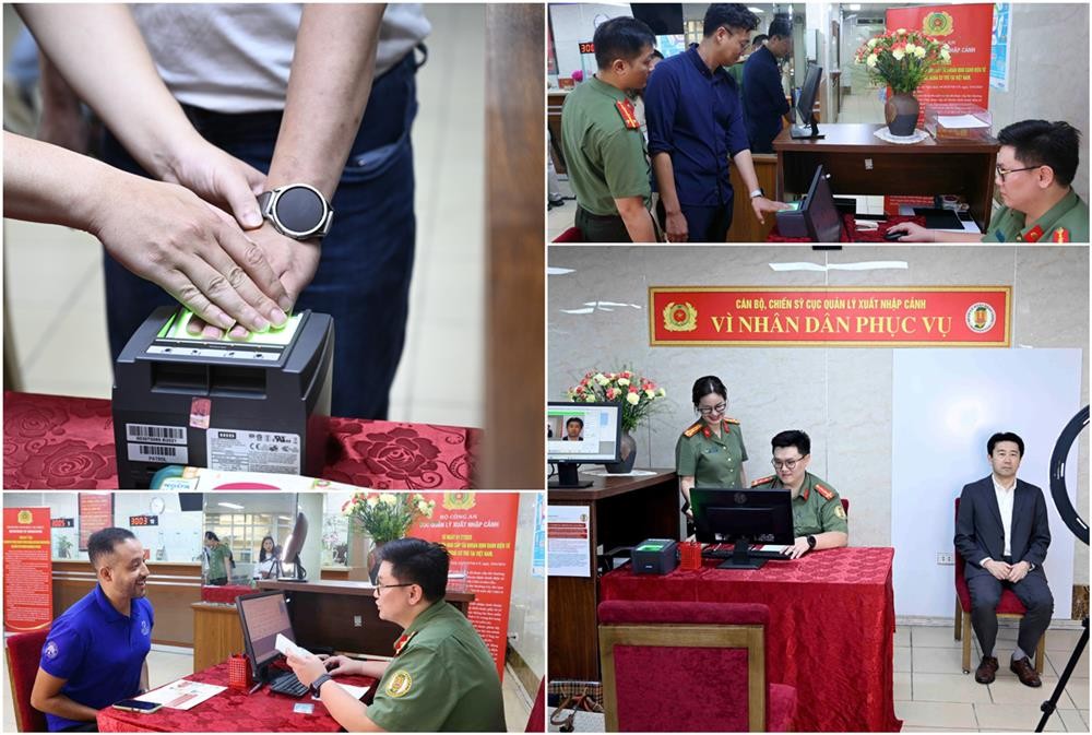 Cán bộ, chiến sĩ Cục Quản lý xuất nhập cảnh tận tình hướng dẫn người nước ngoài thủ tục đăng ký định danh diện tử. (Ảnh: Bộ Công an)