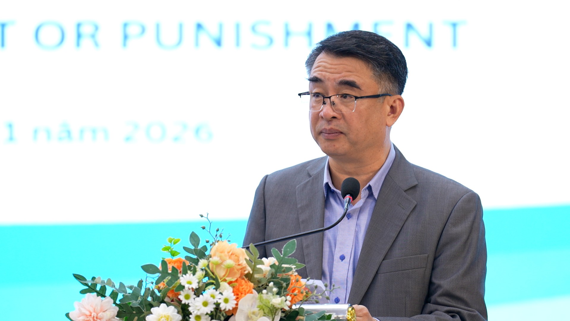 Đại tá Trần Viết Trung, Phó Cục trưởng Cục Đối ngoại, Bộ Công an phát biểu khai mạc hội thảo. 