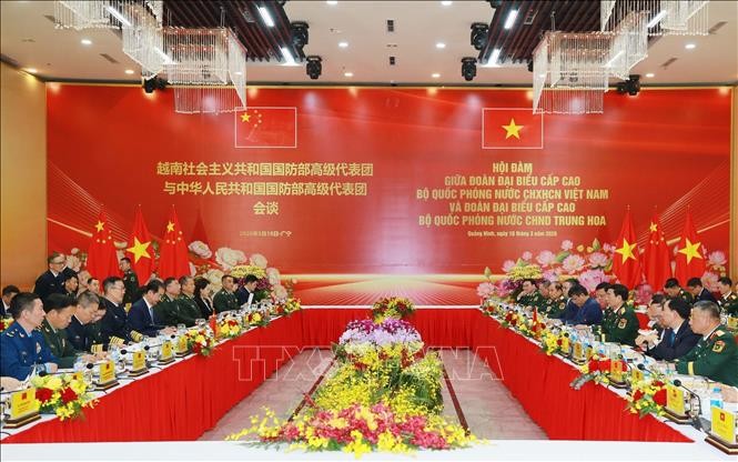 Hội đàm giữa Bộ trưởng Quốc phòng hai nước. (Ảnh: TTXVN)