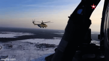 Video: Cận cảnh trực thăng vận tải Mi-26 Nga vận chuyển Su-27 bằng cáp treo