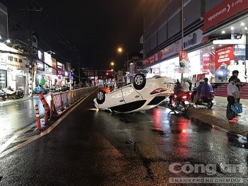 tin tuc tai nan giao thong tngt sang 38 o to lat giua duong sai gon nhieu nguoi may man thoat chet