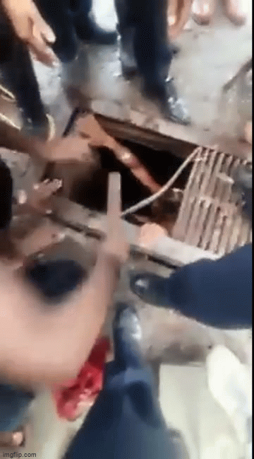 Video: Nghẹt thở cảnh giải cứu cậu bé bị cuốn vào ống cống khi đi tắm sông