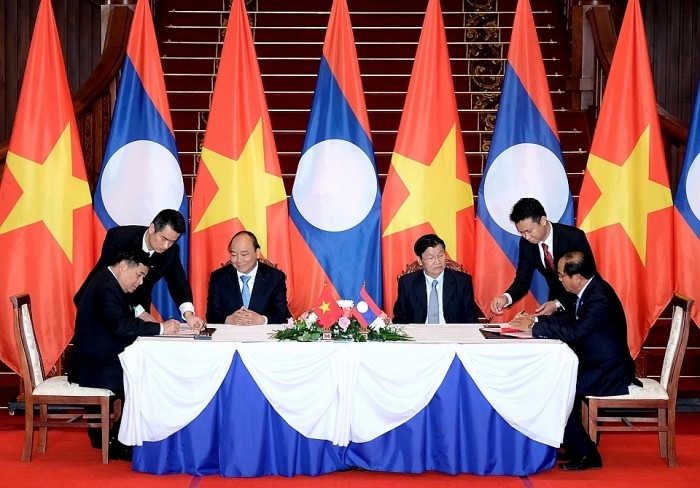 [Photo] Quan hệ hữu nghị vĩ đại, đoàn kết đặc biệt Việt Nam-Lào | Chính trị | Vietnam+ (VietnamPlus)