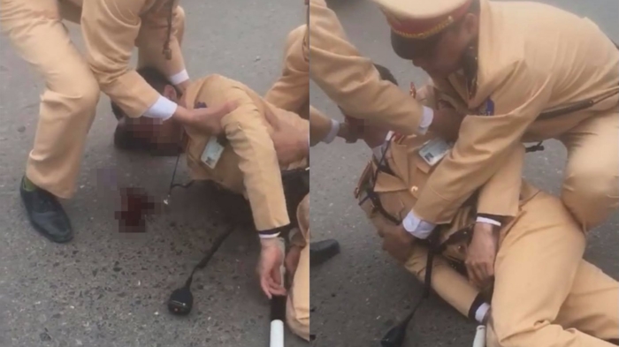 ha noi danh tinh doi nam nu vuot den do tong trung uy csgt bat tinh