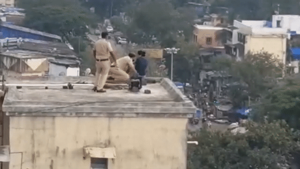 Video: Nghẹt thở xem màn giải cứu cô gái định tự tử trên sân thượng