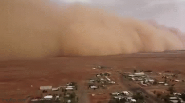 Cận cảnh bão cát khổng lồ sức gió lên đến 110km/h cuốn qua thị trấn như "ngày tận thế"