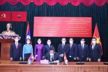 tp ho chi minh va vieng chan lao day manh hop tac cac so ban nganh va doan the hai dia phuong
