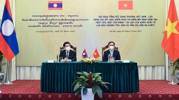 Việt Nam - Lào: Cải tiến mô hình phù hợp nhất với cặp cửa khẩu Lao Bảo - Đen Sạ Vẳn Việt Nam - Lào: Cải tiến mô hình phù hợp nhất với cặp cửa khẩu Lao Bảo - Đen Sạ Vẳn