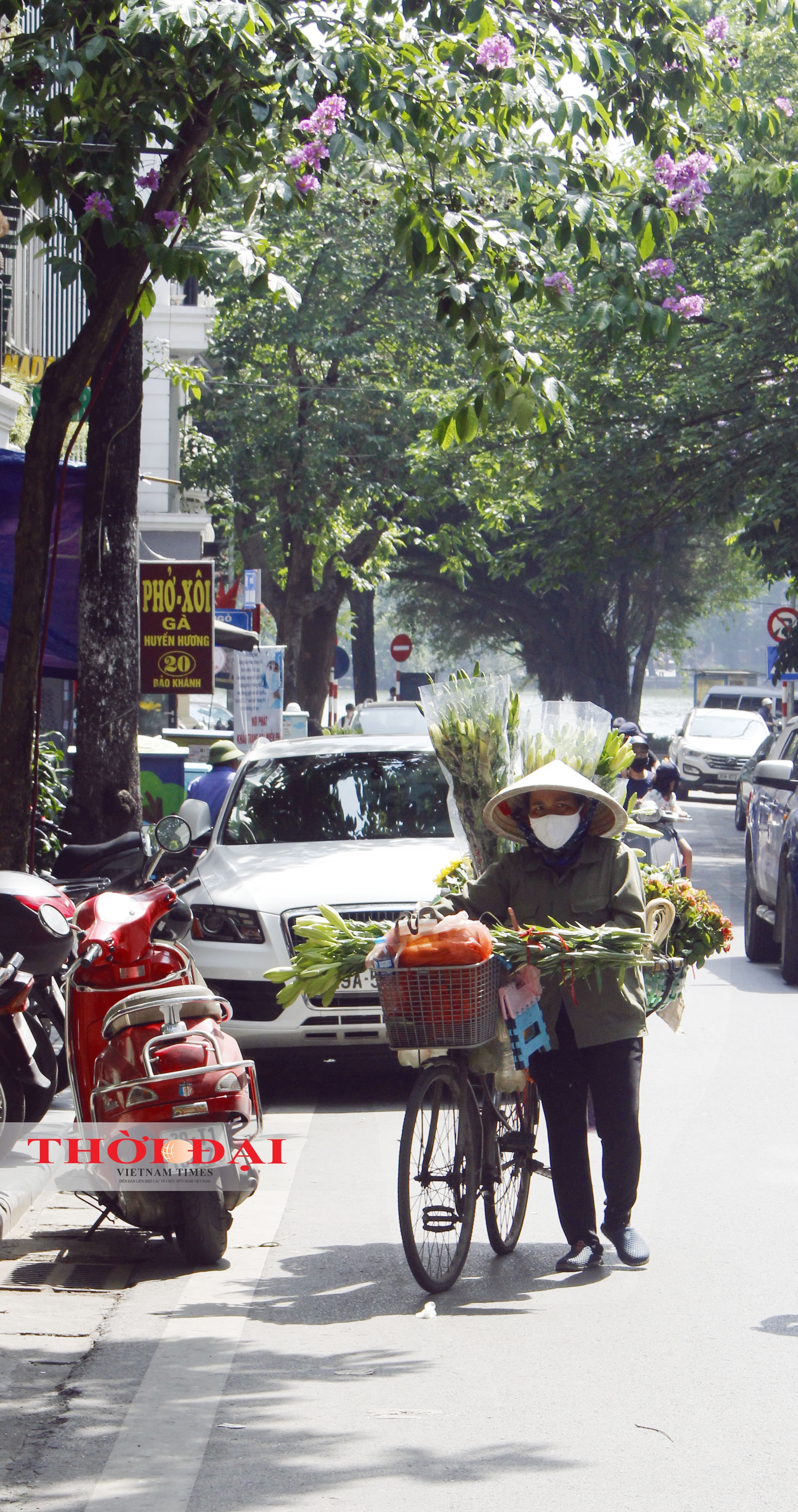 chum anh cuoc song cua nguoi dan o ha noi trong trang thai binh thuong moi