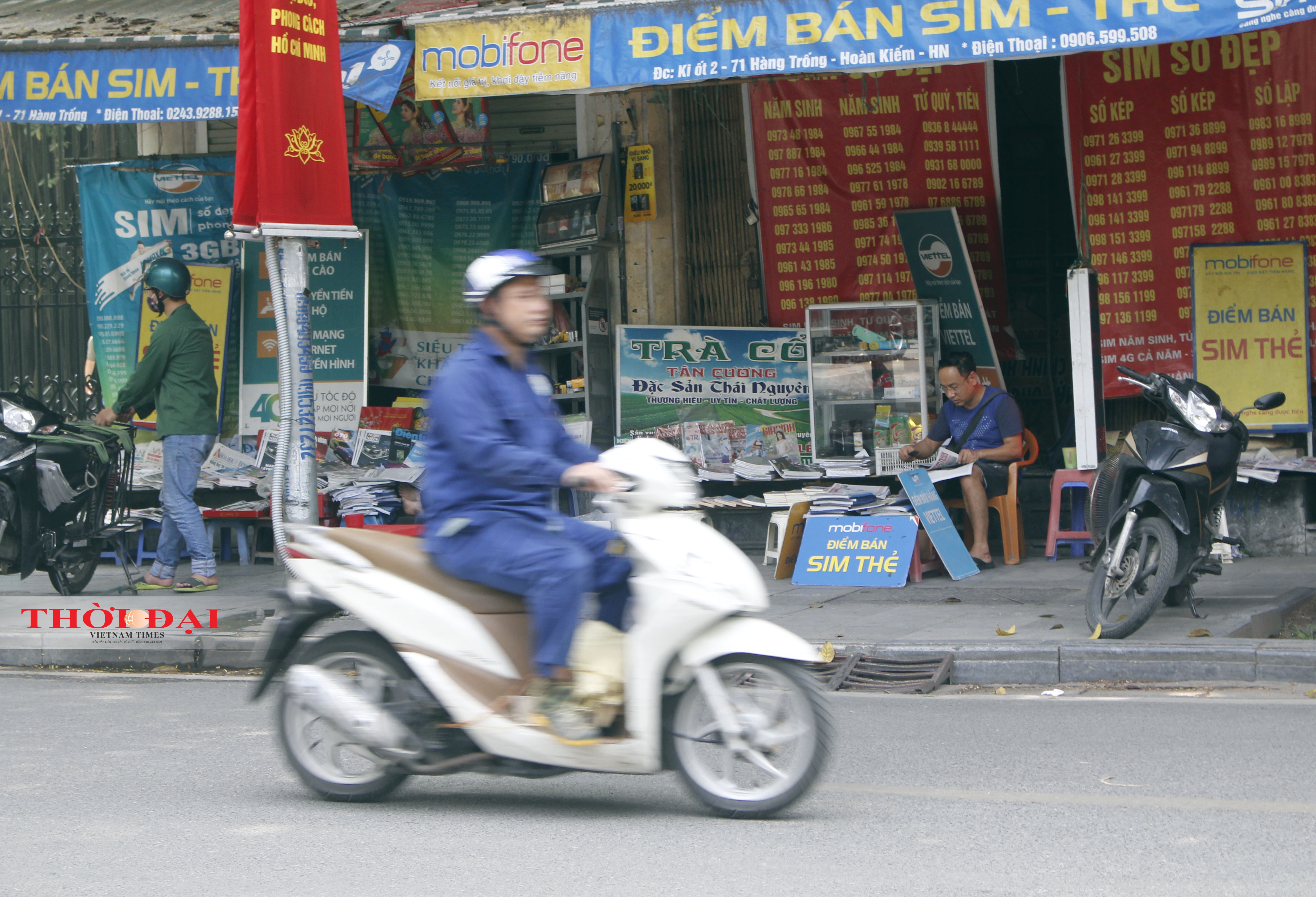 chum anh cuoc song cua nguoi dan o ha noi trong trang thai binh thuong moi