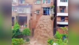 Lũ quét ở Trung Quốc: Bùn lầy chảy qua cửa sổ như thác đổ