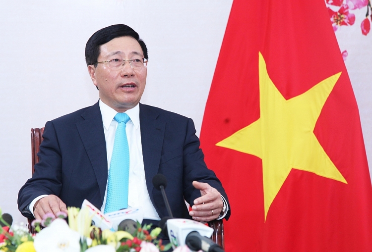 Ủy viên Bộ Chính trị, Phó Thủ tướng Chính phủ, Bộ trưởng Ngoại Phạm Bình Minh.