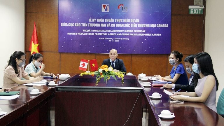 Cục trưởng Cục Xúc tiến thương mại (Bộ Công Thương Việt Nam) Vũ Bá Phú phát biểu tại Lễ ký Biên bản thỏa thuận hợp tác để triển khai các hoạt động nâng cao năng lực xuất khẩu cho các doanh nghiệp do phụ nữ làm chủ Việt Nam giai đoạn 2021-2024.