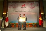 trao huan chuong mat troi moc cho nguyen dai su viet nam tai nhat ban nguyen phu binh