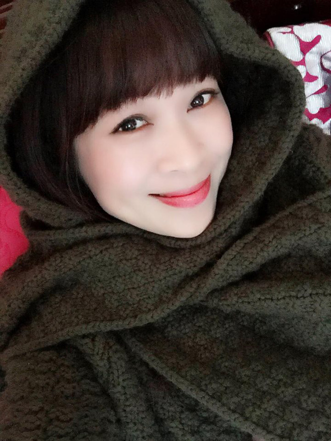 chan dung nguoi me u50 xinh dep gay sot mang xa hoi