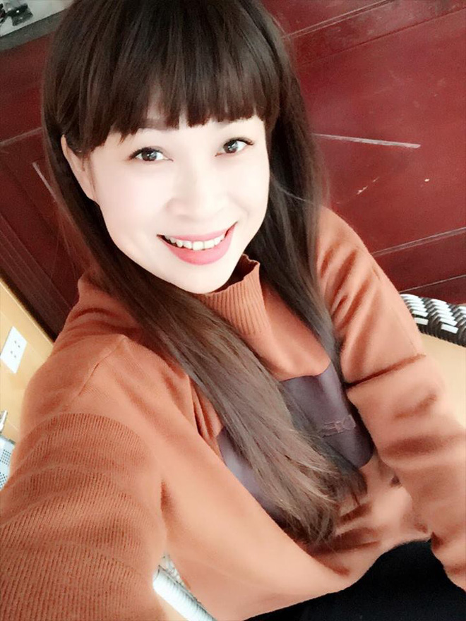 chan dung nguoi me u50 xinh dep gay sot mang xa hoi