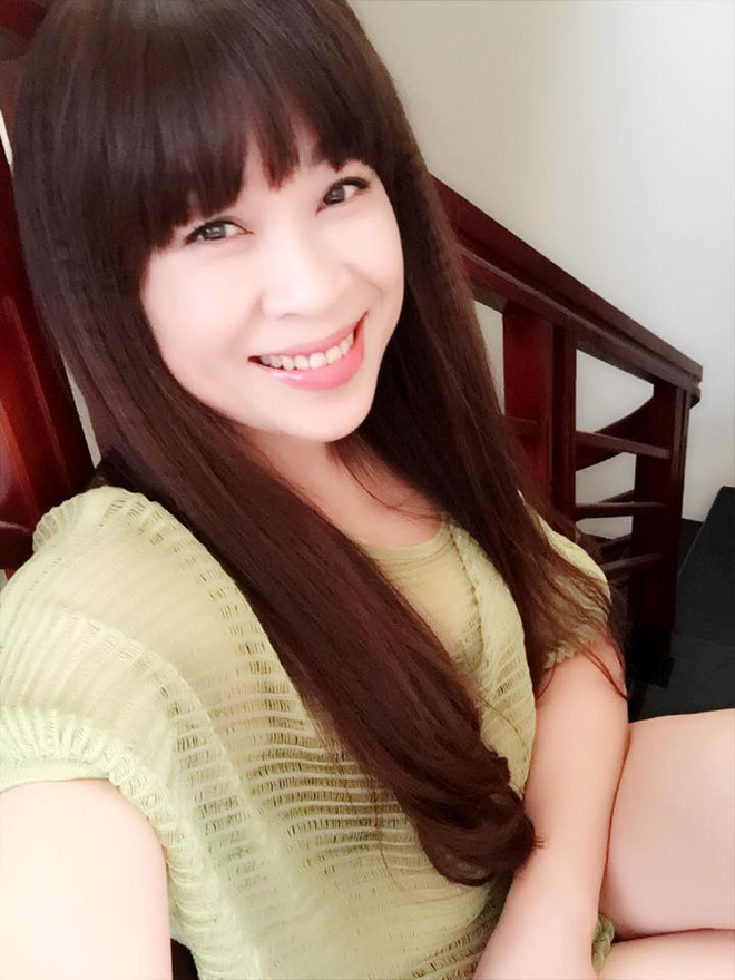 chan dung nguoi me u50 xinh dep gay sot mang xa hoi