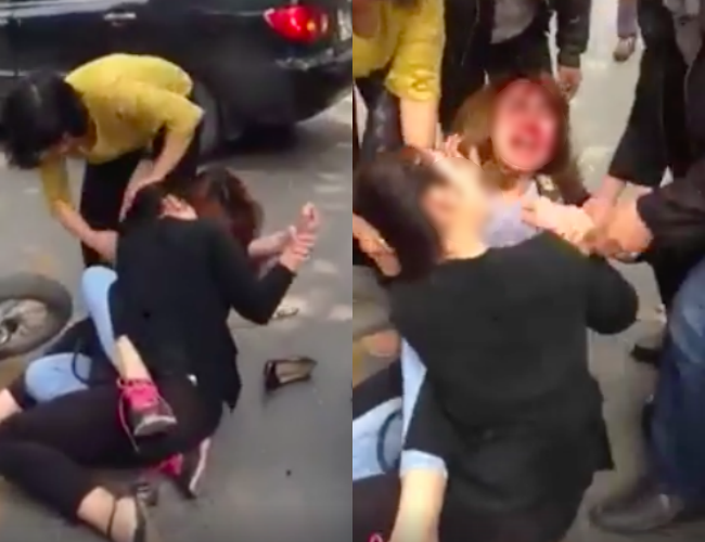 sau va cham giao thong hai co gai lao vao tum toc giang co giua pho ha noi