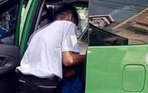 sai gon tieu bay vao xe taxi nguoi dan ong bi 2 tai xe danh nhap vien