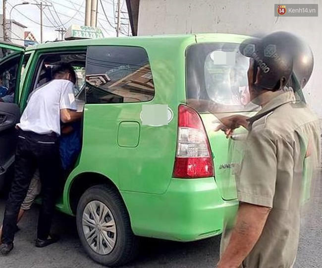 tieu bay vao xe taxi nguoi dan ong bi 2 tai xe danh nhap vien o sai gon