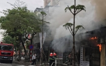 ha noi chay lon tai nha con trai co nhac si van cao