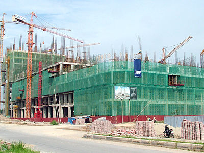 hoat dong dau tu xay dung chiu su dieu chinh cua 12 luat va hon 20000 tieu chuan quy chuan