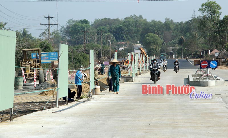 chua den 30 km co mot tram thu phi binh phuoc van muon them bot