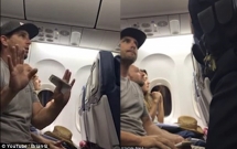 hang hang khong my doa tong khach vao tu va cuop con neu khong chiu nhuong ghe tren may bay