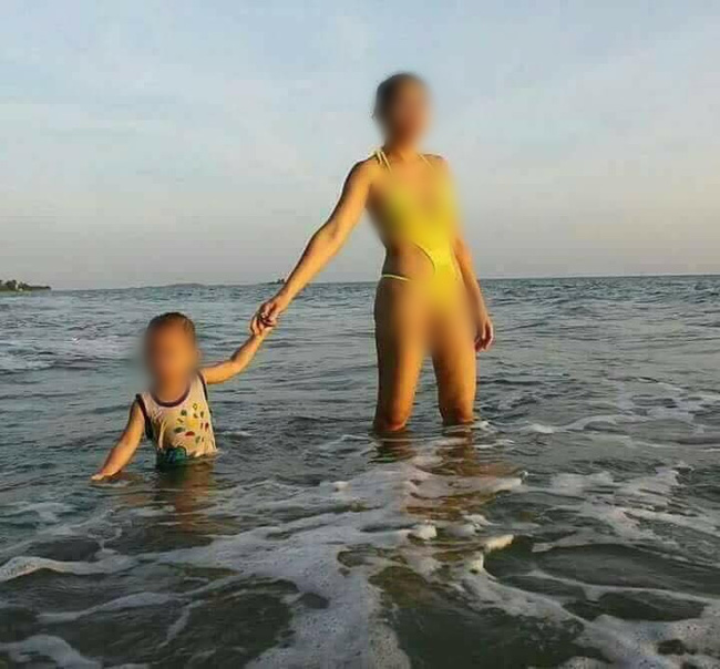 truy tim nguon goc buc anh nguoi phu nu mac bikini ho hang gay soc tren bai bien