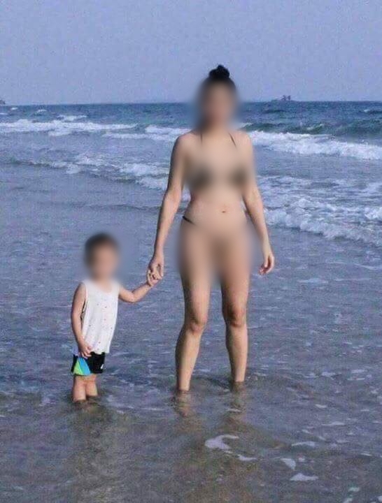 truy tim nguon goc buc anh nguoi phu nu mac bikini ho hang gay soc tren bai bien