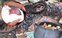 thai lan phat hien be trai so sinh van con nhau thai bi bo lai trong thung dung rac ven duong