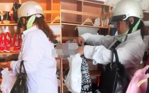giua trua nang nong me chong di mua ao cho con dau va cau noi khien nhieu nguoi cam dong