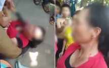 nghe an nguoi phu nu bi nguoi dan di dao vao co yeu cau khai bao viec bat coc tre em