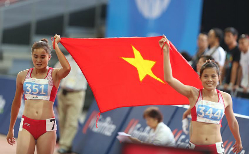 co gai vang dien kinh viet nam chay de nuoi me nuoi chi