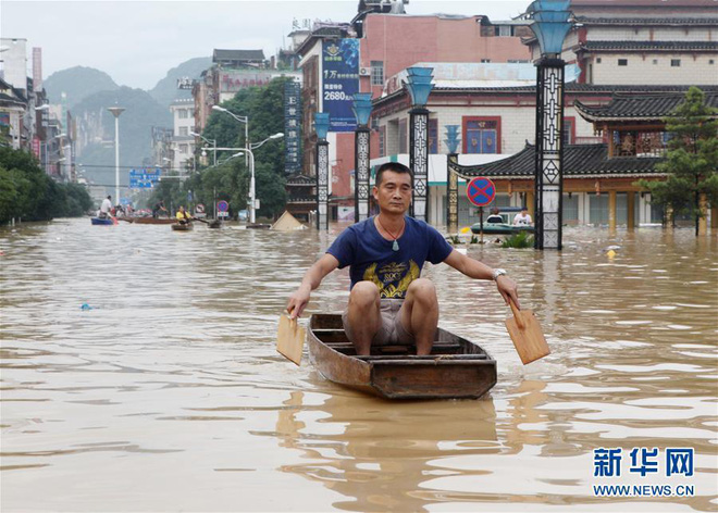 mua lu kinh hoang keo dai nhieu ngay hang tram ngan nguoi dan trung quoc keo nhau di so tan