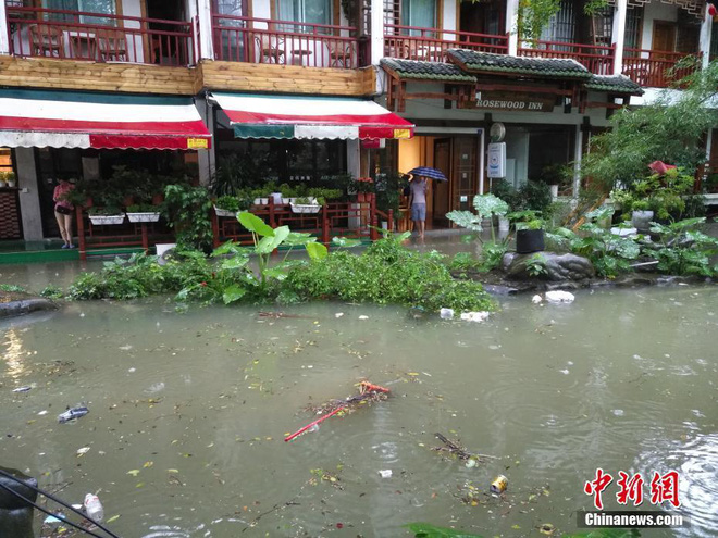 mua lu kinh hoang keo dai nhieu ngay hang tram ngan nguoi dan trung quoc keo nhau di so tan