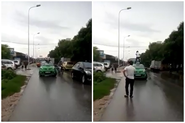 nguoi phu nu treo len noc taxi an va tai xe tuc gian lao len danh