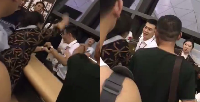 bi hanh khach tat va cao vao mat nam nhan vien san bay van mim cuoi tiep don