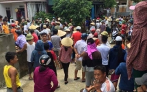 ha tinh dan lang bao vay nguoi phu nu co hanh vi bat coc be trai 2 tuoi