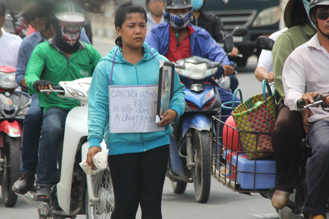 vu be gai 13 tuoi ca mau tu tu nghi xam hai me om di anh con uat uc cau cuu vks toi cao