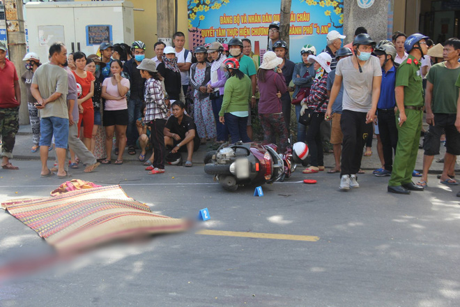 da nang xe may va cham kinh hoang voi o to vo chet chong bi thuong